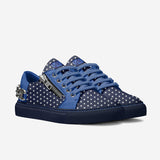 Blue low-top sneaker with metallic details, side zip and chain on the back — side view