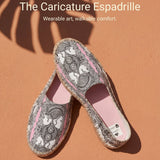 Pink women's espadrilles with caricature print, jute insole and non-slip rubber sole — rear view
