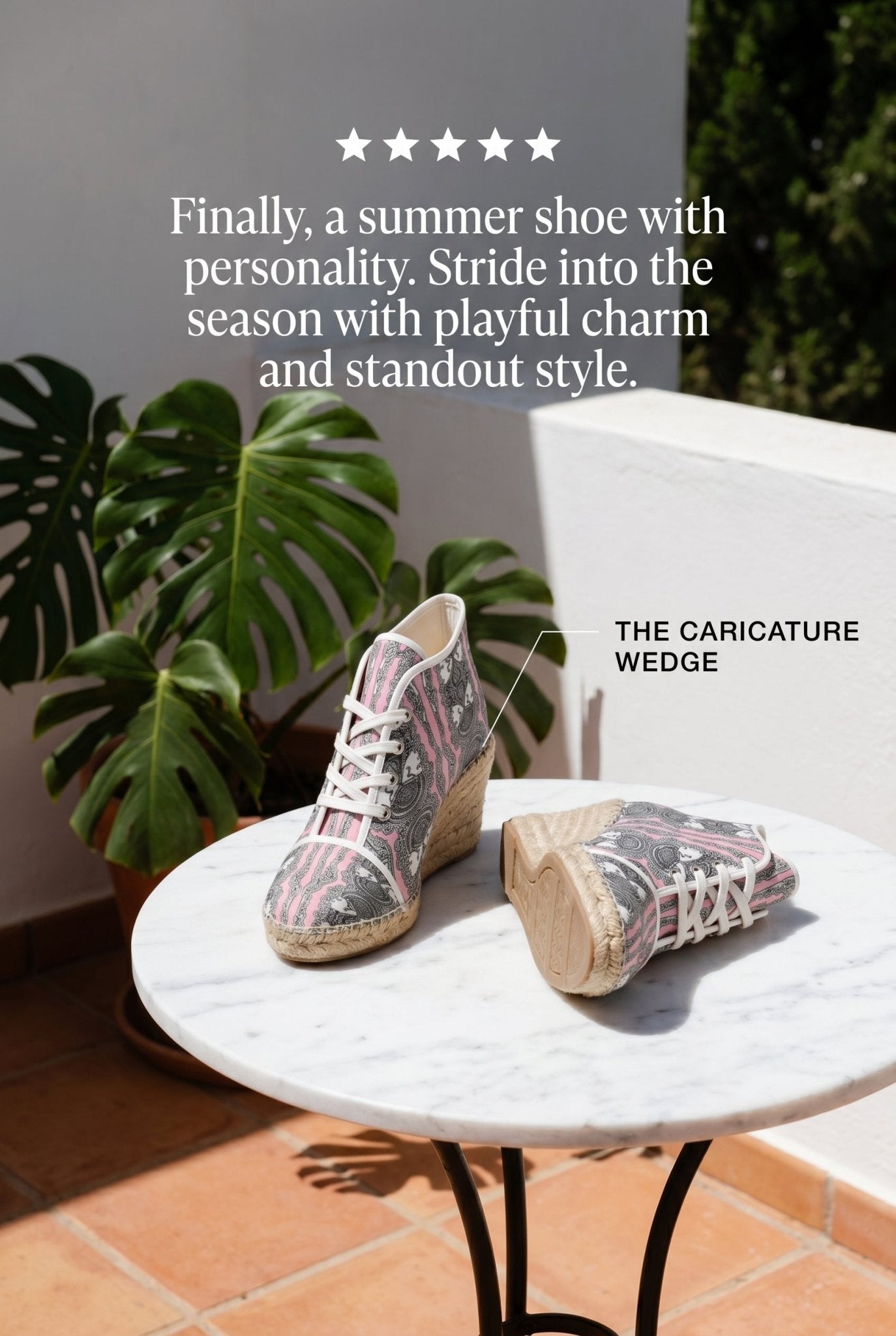Pink caricature print wedge espadrilles with natural jute platform and rubber sole — rear view