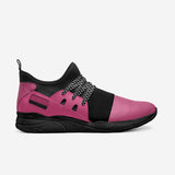 Pink leather slip-on sneakers with carved rubber sole and elasticized front panels — rear view