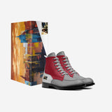 Men's red leather biker ankle boot with embossed panels and black rubber sole — side view