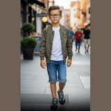 Kids black and green camo low-top sneakers with quilted tongue and thin rubber cup sole
