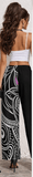 High-waist wide-leg women's pants with black and purple abstract print, soft polyester fabric — additional view 6