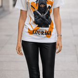 White unisex t-shirt with a bold ninja courage graphic printed on the front — side view