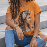 Women's orange crewneck T-shirt with Rooted in Grace graphic print — product detail