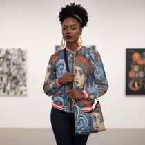 Women's whimsical blue bomber jacket with all-over print, ribbed collar and zip front
