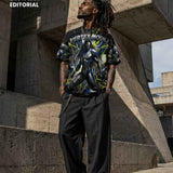 Black men's crew neck t-shirt with multicolor Vertex Mode geometric graphic — alternate view