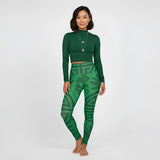 High-waisted emerald green yoga leggings with all-over Feng Shui print and smooth waistband