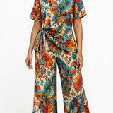 Two-piece colorful bird print women's set with side-tie short-sleeve top and wide-leg pants