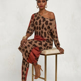Women's two-piece off-shoulder set in diagonal red animal print with stretch fabric — side view