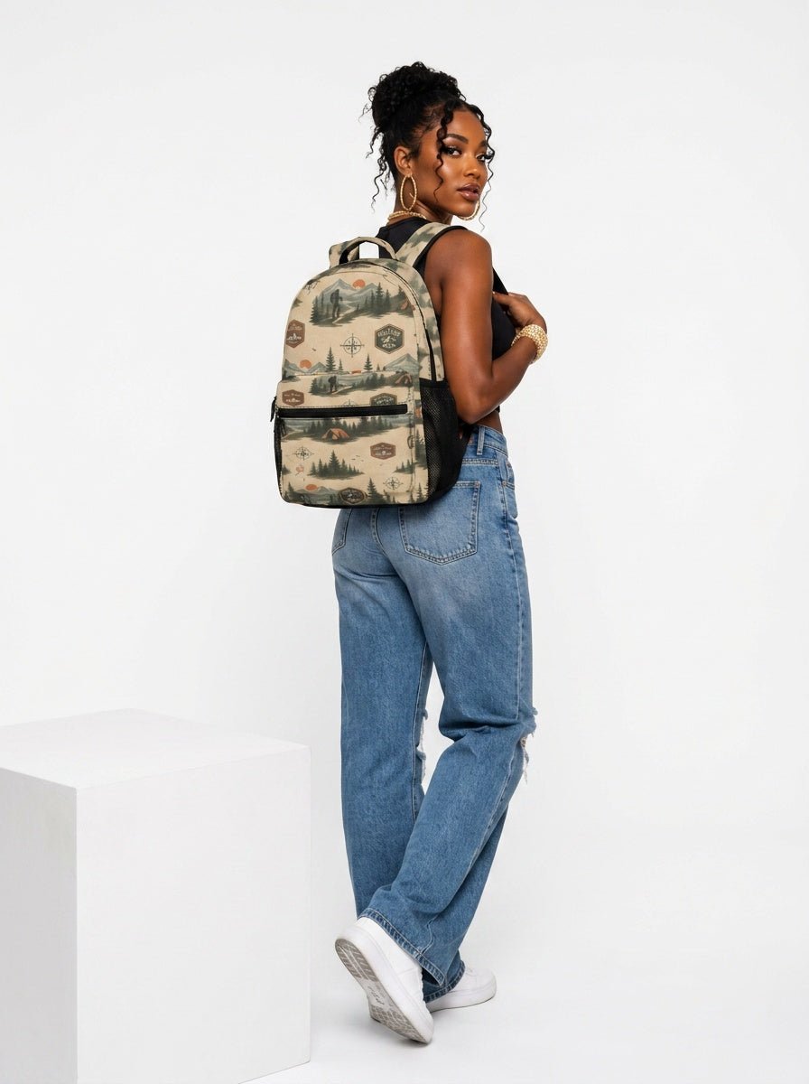 Beige 17-inch backpack with front pocket, mesh side pockets, padded straps, and orange buckle detail