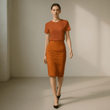 High-waisted orange pencil skirt with center back seam and rear slit — alternate view