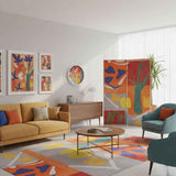 Orange abstract round wall clock with bold print, approximately 15.75 inches diameter