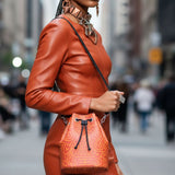 Orange abstract Nappa leather bucket bag with drawstring closure and faux suede lining, compact 10 x 9.1 — additional view 6