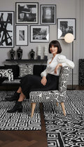 Rich and Rich White Black Feng Shui Occasional Chair with velour upholstery and tapered wooden legs