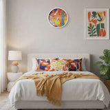 Orange abstract round wall clock with bold print, approximately 15.75 inches diameter — rear view