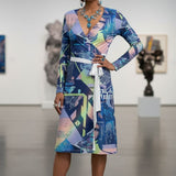 Blue multicolor graphic wrap dress with V-neck, long sleeves and above‑knee length