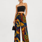 Women's blue multicolor pants set with off-shoulder V-neck top and navy blazer — additional view 7