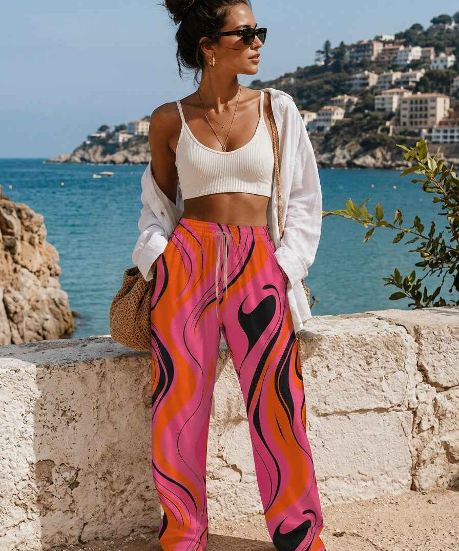 Pink swirl women's relaxed straight-leg pants with elastic waistband and side pockets — alternate view