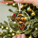 Round crystal glass ornament depicting the African continent with red ribbon and gift box — additional view 8