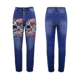 Women's high-waist jeans with floral embroidery on front and five-button closure — side view