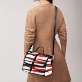 Women's red and black curved design PU leather satchel with top handle and strap — additional view 6