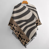 Loose women's tassel cape in smooth polyester blend with tassel trim — product detail