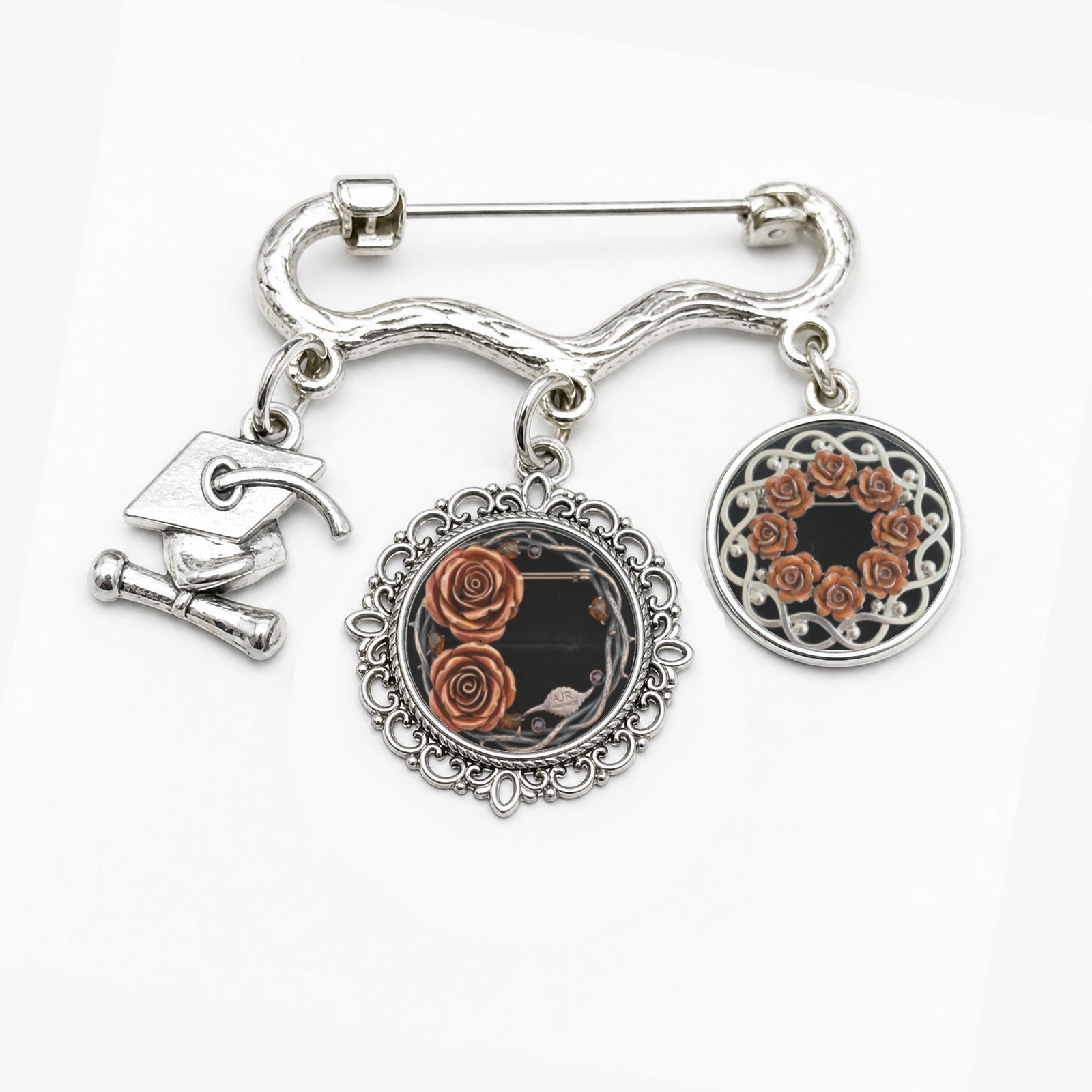 Double round photo charm brooch with Burnt Orange Roses motif and a small graduation cap charm