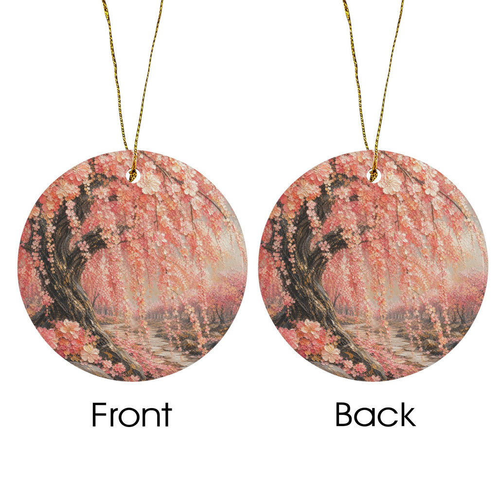 Two round hanging ornaments shown side by side on a white background, labeled Front and Back. Each ornament has a gold necklace cord and features an artistic print of a pink flowering tree in a reflective water scene.