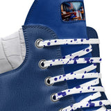 Blue men's high-top boot with lugged brown sole, lace-up front and padded ankle collar — rear view