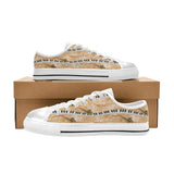 Men’s beige low-top sneakers with piano and saxophone artwork and navy-black accents — additional view 9