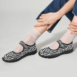 Women's Mary Jane shoes in black and white zebra pattern with Velcro strap and mesh upper — additional view 10