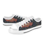 Blue floral women's canvas lace-up sneakers with metal eyelets and rubber outsole — side view