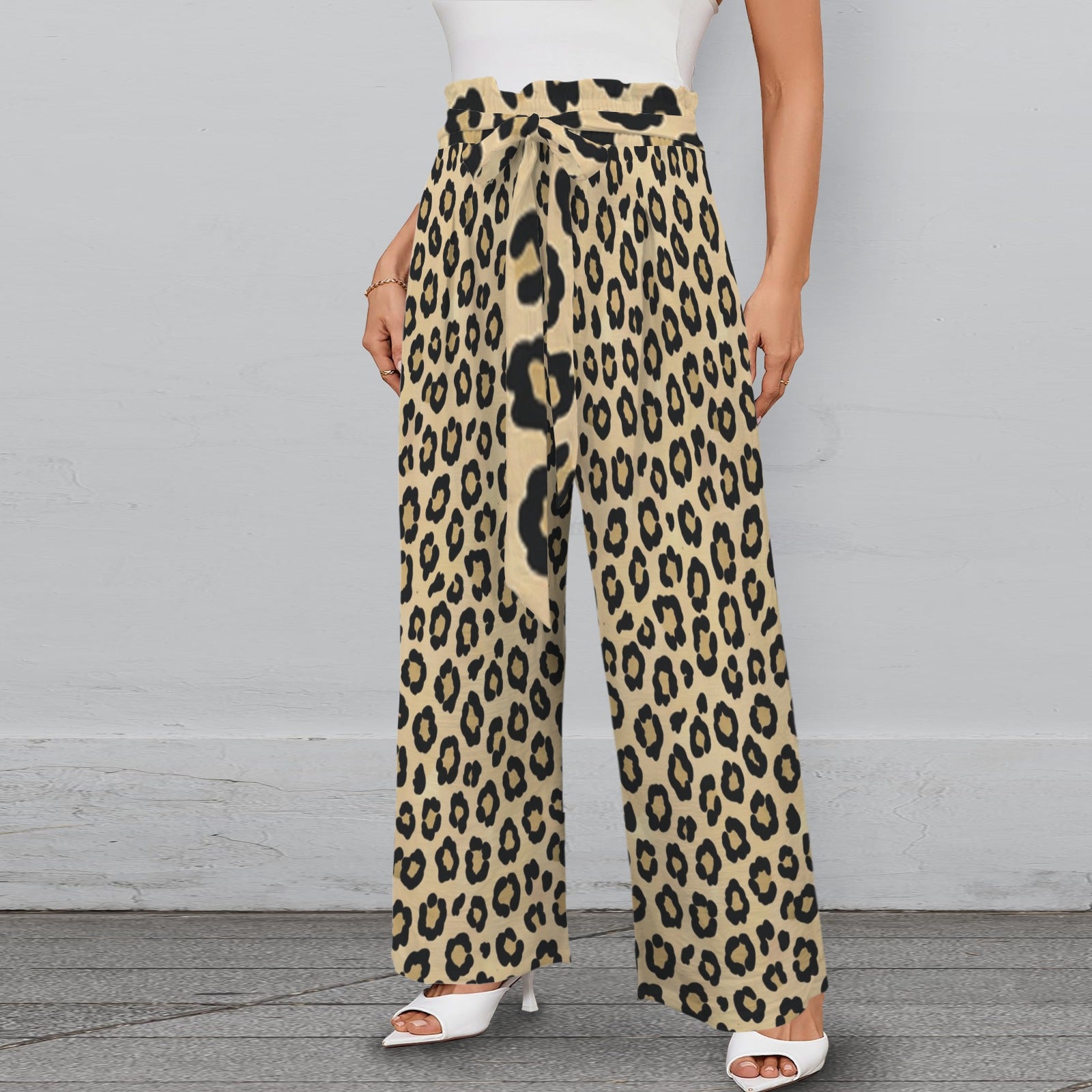 Brown animal print wide-leg women's pants with elastic waistband, tied belt, and side pockets — product detail