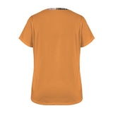Women's orange crewneck T-shirt with Rooted in Grace graphic print — rear view