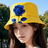 Reversible bucket hat with yellow and blue rose print, woven material and matte finish in multiple sizes — side view