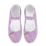 Pink Mary Jane shoe with Japanese cherry blossom print, mesh upper and Velcro strap on a white sole — rear view