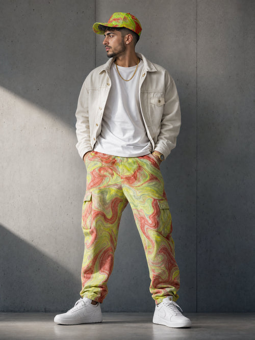 Middle Eastern male model wearing iridescent lime and red fluid art baseball cap