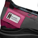 Magenta and gray elastic slip-on women's sneaker with low-profile rubber sole and logo window — side view
