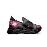 Magenta and gray elastic slip-on women's sneaker with low-profile rubber sole and logo window — rear view