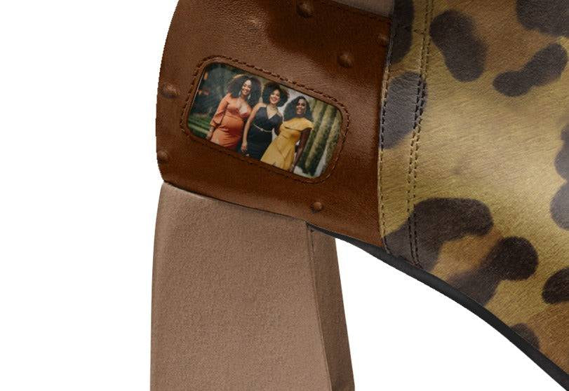 Brown animal-print women's high-top boot with oversized side belt and a 7 cm square heel — side view