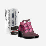 Pink and magenta animal-print leather boot heels with 8.5 cm heel and rubber sole